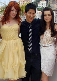 Nicole LaLiberte, director Gregg Araki and Roxane Mesquida at the photocall of "Kaboom" during the 63rd Cannes Film Festival.