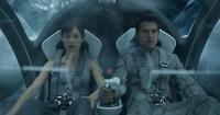Olga Kurylenko and Tom Cruise in "Oblivion."