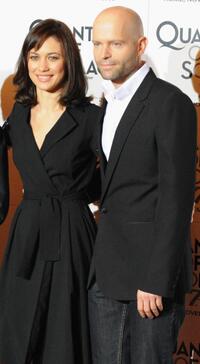 Olga Kurylenko and Director Marc Forster at the photocall of "Quantum of Solace."