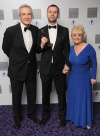 Larry Lamb, Michael Wynne and Barbara Windsor at the Laurence Olivier Awards in England.
