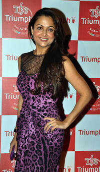 Amrita Arora at the Triumph Lingerie 2011 fashion show in Mumbai.