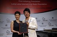 Lang Lang and Guest at the Hong Kong Academy for Performing Arts, Kate Xintong Lee and Jonathan Jun Yang.