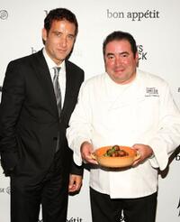 Clive Owen and Emeril Lagasse at the premiere of "The Boys are Back."