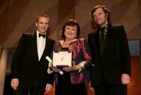 Hanna Laslo, Ralph Fiennes and Emir Kusturica at the Closing Awards Ceremony during the 58th International Cannes Film Festival.