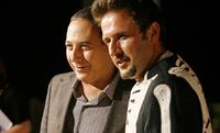David Arquette and Paul Reubens pose for photographers at the DVD release party for the "300" held at Petco Park Stadium.
