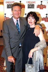 John Phillip Law and Guest at the 29th Annual Saturn Awards.