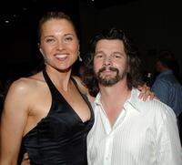 Lucy Lawless and Ronald D. Moore at the "Battlestar Galactica" season four party.
