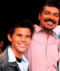 Taylor Lautner and George Lopez at the premiere of "The Adventures of Shark Boy and Lava Girl in 3D."