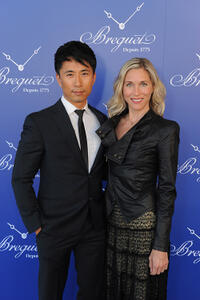 James Kyson Lee and Guest at the Breguet Celebrates Sponsorship of "Paris: Life & Luxury" Exhibit in California.