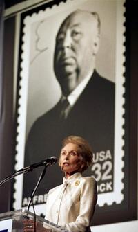 Janet Leigh at the unveiling ceremony of a US postage stamp bearing Alfred Hitchcock's portrait.