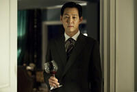 Lee Jeong-jae as Master Hoon in "The Housemaid"