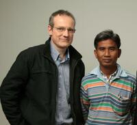 Rob Lemkin and Thet Sambath at the 2010 Sundance Film Festival.