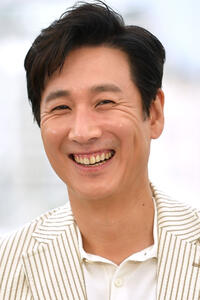 Lee Sun-gyun at the photocall for "Parasite" during the 72nd annual Cannes Film Festival.