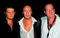 Julian Lennon, Director Kim Kindersley and Guest at the Greenpeace Party during the 60th International Cannes Film Festival.