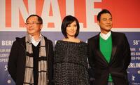 Director Johnnie To, Kelly Lin and Simon Yam at the photocall of "Sparrow" during the 58th Berlinale Film Festival.