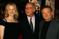 Barry Levinson, Laura Linney and actor Robin Williams at Graumans Chinese Theatre for the premiere of Universal Pictures "Man of the Year".