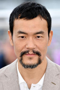 Liao Fan at the photocall for "The Wild Goose Lake" during the 72nd annual Cannes Film Festival.