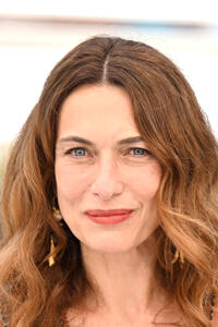 Natacha Lindinger at a photocall for "OSS 117 : Alerte Rouge en Afrique Noire" (OSS 117 : From Africa With Love) during the 74th annual Cannes Film Festival. 