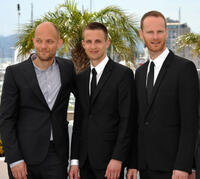 Writer Eskil Vogt, Anders Danielsen Lie and director Joachim Trier at the photocall of "Oslo" during the 64th Cannes Film Festival in France.