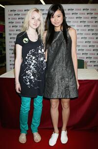 Evanna Lynch and Katie Leung at the photocall in Tescos Extra Watford.
