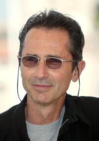 Thierry Lhermitte at the photocall of "And now... Ladies and gentlemen" during the 55th Cannes film festival.
