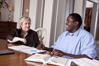 Kathy Bates as Miss Sue and Quinton Aaron as Michael Oher in "The Blind Side."