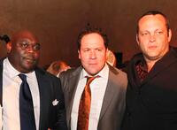Faizon Love, Director Jon Favreau and Vince Vaughn at the after party of the premiere of "Iron Man."