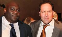 Faizon Love and Director Jon Favreau at the after party of the premiere of "Iron Man."