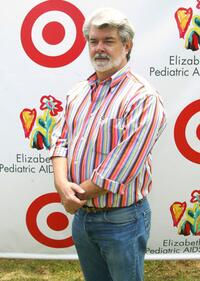 George Lucas and Sienna Miller at the Elizabeth Glaser Pediatric Aids Foundation.