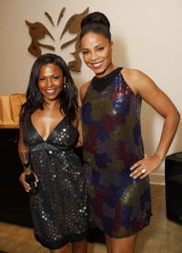 Nia Long and actress Sanaa Lathan at the boutique launch and holiday shopping event.