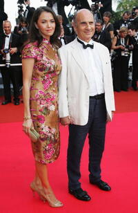 Guy Marchand and Guest at the premiere of "Le Scaphandre Et Le Papillon" (The Diving Bell and the Butterfly) during the 60th International Cannes Film Festival.