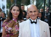 Guy Marchand and Guest at the screening of "Le Scaphandre et le Papillon" during the 60th edition of the Cannes Film Festival.