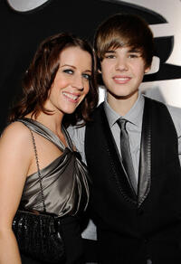 Pattie Mallette and Musician Justin Bieber at the 52nd Annual GRAMMY Awards in California.