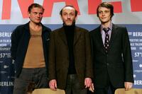 Devid Striesow, Karl Markovics and August Diehl at the press conference of "The Counterfeiters" during the 57th Berlin International Film Festival.