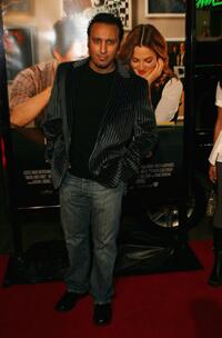 Aasif Mandvi at the premiere of "Music and Lyrics."