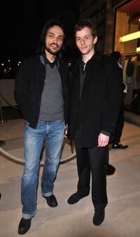 Vincent Martinez and Malik Zidi at the opening of a new YSL store.
