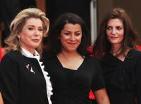Catherine Deneuve, director Marjane Satrapi and Chiara Mastroianni at the premiere of "Persepolis" during the 60th International Cannes Film Festival.