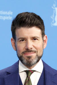Johnathan McClain at the "The Outfit" photocall during the 72nd Berlinale International Film Festival.