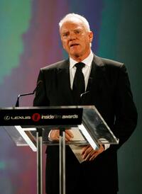 Malcolm McDowell presents an award during the 2005 Lexus Inside Film Awards.