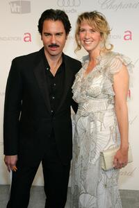Eric McCormack and Janet Holden at the 15th Annual Elton John AIDS Foundation Academy Awards viewing party.
