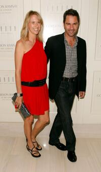Janet Holden and her husband Eric McCormack at the Chef Gordon Ramsay's celebration opening party.