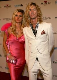 Susan Holmes and Duff McKagan at the Clive Davis Annual Grammy party.