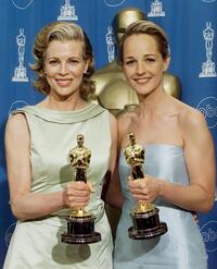 Kim Basinger and Helen Hunt at the 70th Annual Academy Awards at the Shrine Auditorium in Los Angeles.