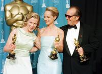 Kim Basinger, Helen Hunt and Jack Nicholson at the conclusion of the 70th Annual Academy Awards at the Shrine Auditorium in Los Angeles.