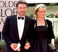 Kim Basinger and her husband Alec Baldwin at the 55th Annual Golden Globe Awards at the Beverly Hilton.