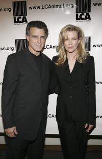 Kim Basinger and Chris DeRose at the premiere of "Dealing Dogs".