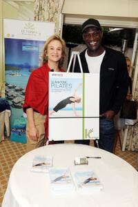 Peter Mensah and Guest at the DPA Golden Globes Gift Suite.