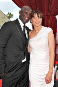 Peter Mensah and Lucy Lawless at the Closing Ceremony during the 2010 Monte Carlo Television Festival.