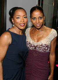 Angela Bassett and Robinson Peete at the ESCADA Grand-Reopening.