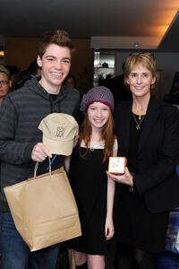 Gabriel Basso, Annalise Basso and Guest at the 2011 DPA Golden Globes Gift Suite in California.